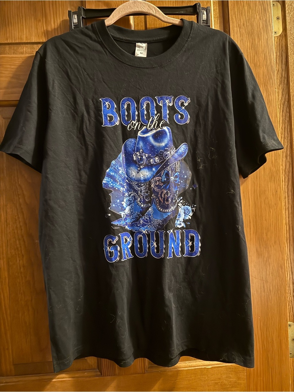 Women’s medium Black T-Shirt with Blue Cowboy Graphic - Boots on the Ground